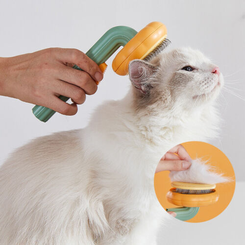 The Pumpkin Pet Grooming Brush with Pop-out Self Cleaning Technology